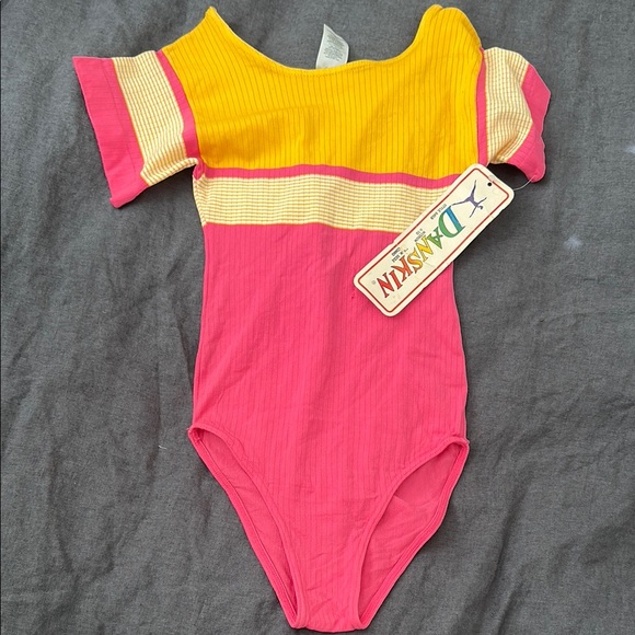 Vintage danskin 1980s child’s medium nylon leotard tags still attached - Picture 1 of 4
